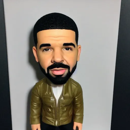 Image similar to drake as a bobblehead figure, ebay photo