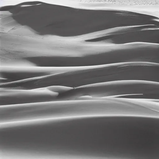 Prompt: A photograph of sand dunes by Ansel Adams