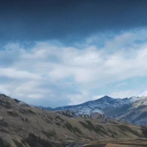 Image similar to cinematic film still of fields and a mountain range