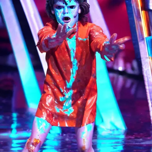 Prompt: stranger things demogorgon getting slimed at the kids choice awards