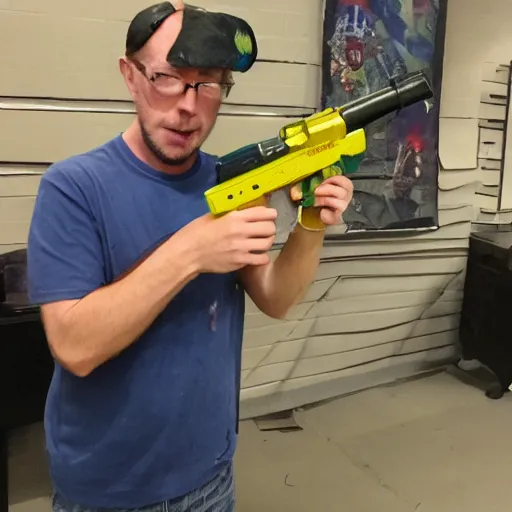 Image similar to forgottenweapons ian mccollum displays the gummy blaster