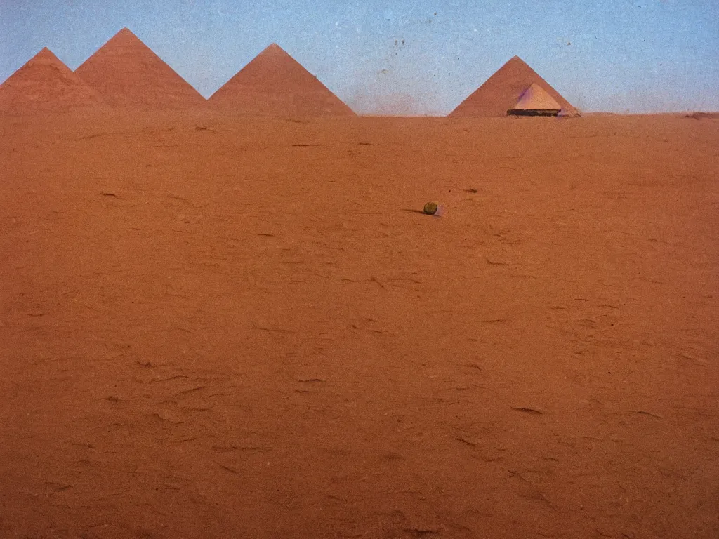 Image similar to autochrome of mechanical pyramid upside-down dust volumetrics desert in the style of Straylight Dune Villeneuve, grunge, saturation, over amplified