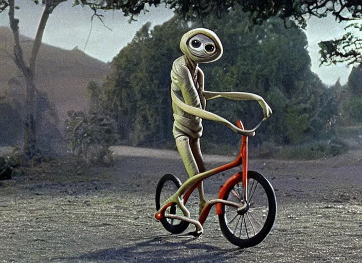 Image similar to the movie et except the alien is mr bean bicycle scene