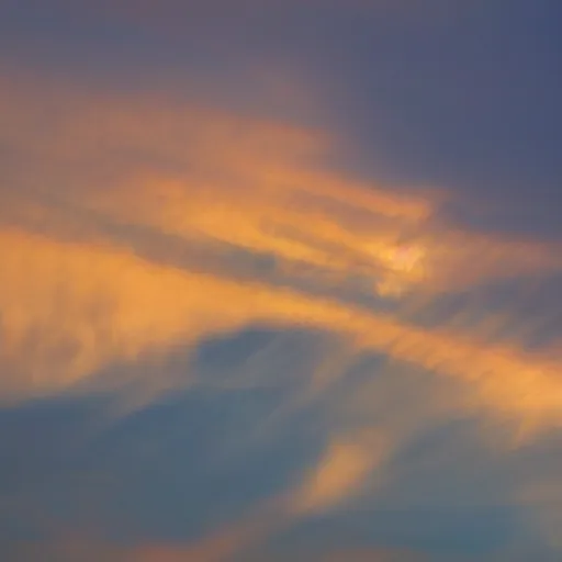 Prompt: sunset clouds in shape of a gigantic angel face
