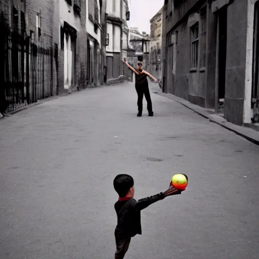 Prompt: a boy playing with a ball in the street vintage style