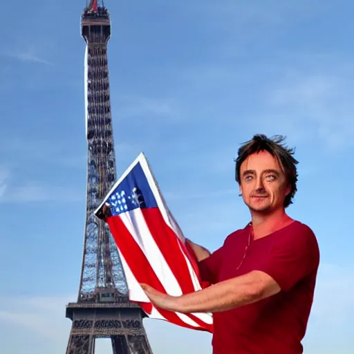 Prompt: Richard Hammond holding up the flag of america on top of the eiffel tower