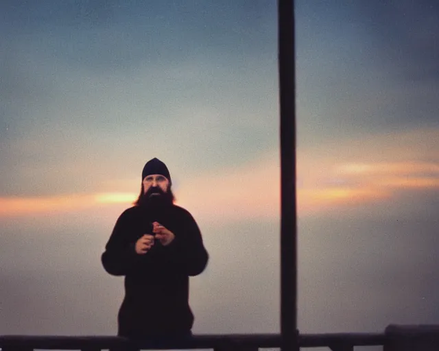 Image similar to lomo photo of 4 0 years russian man with beard and sweater standing on small hrushevka balcony full with cigarette smoke in small russian town looking at sunset, cinestill, bokeh