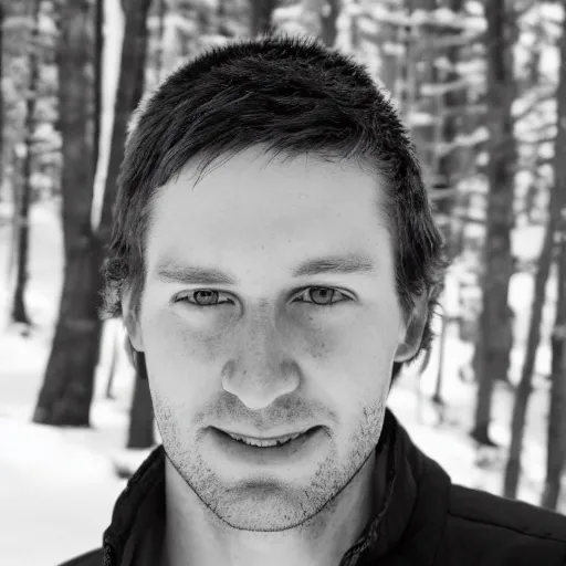 Image similar to black and white portrait of ryan winter in the forest