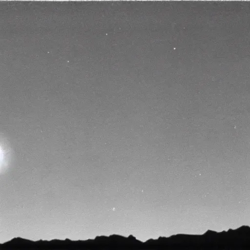 Image similar to distant ufo over the sonoran desert, super 8 camera footage, out of focus