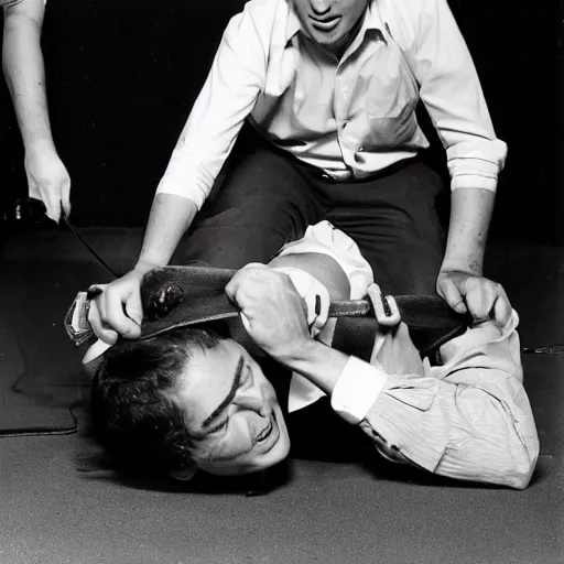 Prompt: Historical photograph of Ben Shapiro being hog-tied, high detail