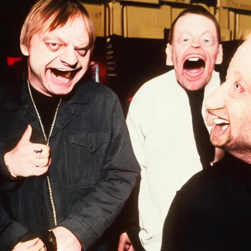 Image similar to Mark E Smith laughing at Fred Durst who is crying and screaming