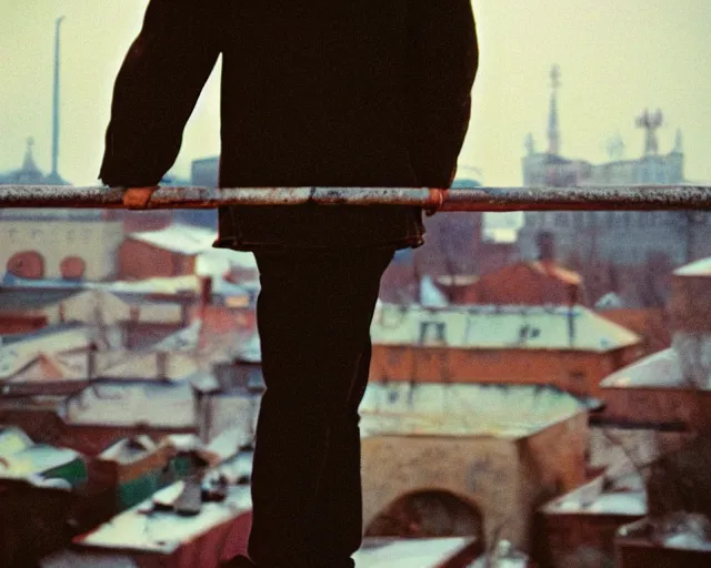 Image similar to lomo photo of man standing on the roof of soviet hrushevka, small town, cinestill, bokeh, out of focus