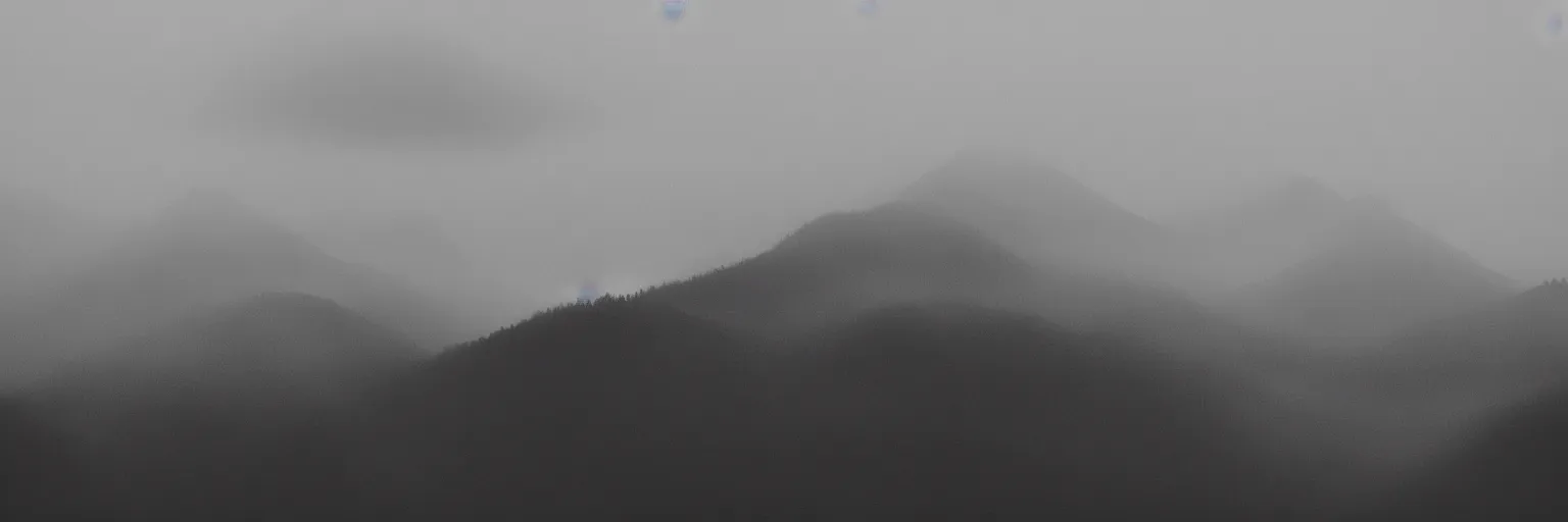 Prompt: monochrome photo of ambient and misty mountains