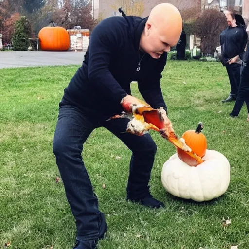 Image similar to billy corgan of the band smashing pumpkins outside on halloween destroying pumpkins in his city because he's angry no one understands his band's name