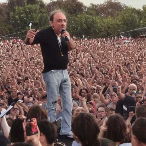 Prompt: raimondo vianello giving a speech in front of a huge crowd at a metal concert