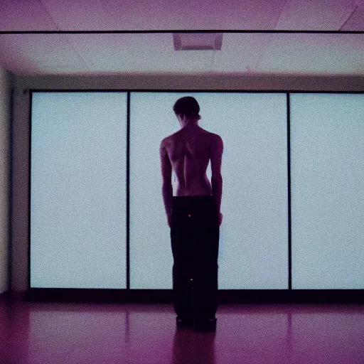 Image similar to kodak portra 4 0 0 photograph of a skinny guy standing in a room with floor to ceiling screens, back view, moody lighting, telephoto, 9 0 s vibe, blurry background, vaporwave colors!, faded!,