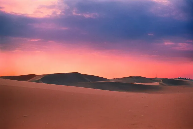 Prompt: blue hour, sand dunes beneath fire, 35mm, film photo, steve mccurry