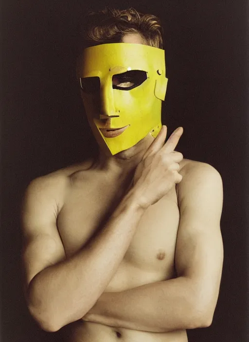 Image similar to a fashion portrait photograph by david lachapelle of a man wearing a leather mask designed by joseph albers, 3 5 mm, color film camera, studio lighting, pentax