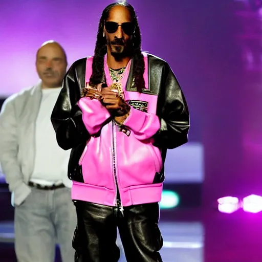 Image similar to Snoop Dogg wearing a pink leather jacket on stage at a music award show holding a dog