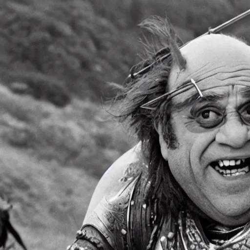 Prompt: Danny DeVito as a Hunnic barbararian on a horse, at the top of a hill overlooking a battleground campsite, film still