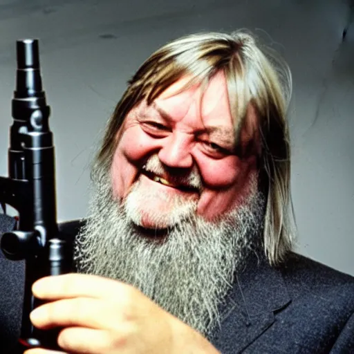 Image similar to laughing robert wyatt pointing a gun at the camera