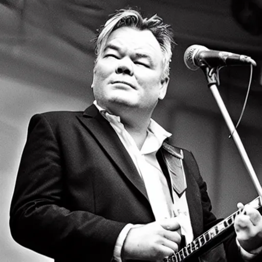 Image similar to Stewart Lee performing with The Smiths