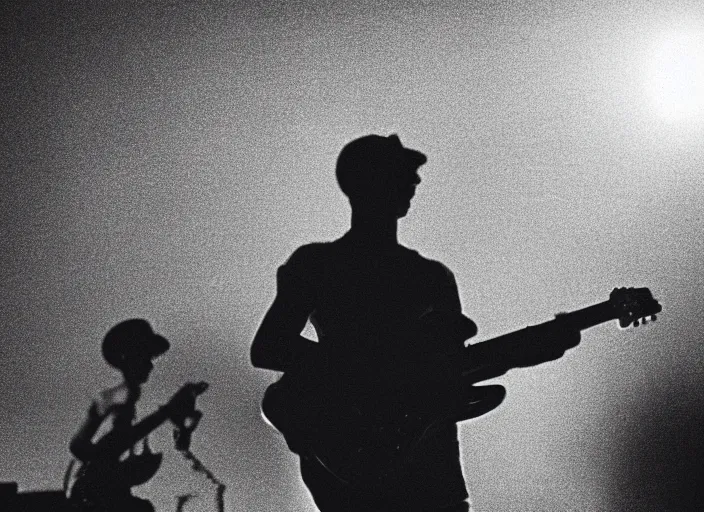 Image similar to a 2 8 mm macro photo from the back of a guitarist in the spotlight on stage at a festival in silhouette in the 1 9 6 0 s, bokeh, canon 5 0 mm, cinematic lighting, dramatic, film, photography, golden hour, depth of field, award - winning, 3 5 mm film grain