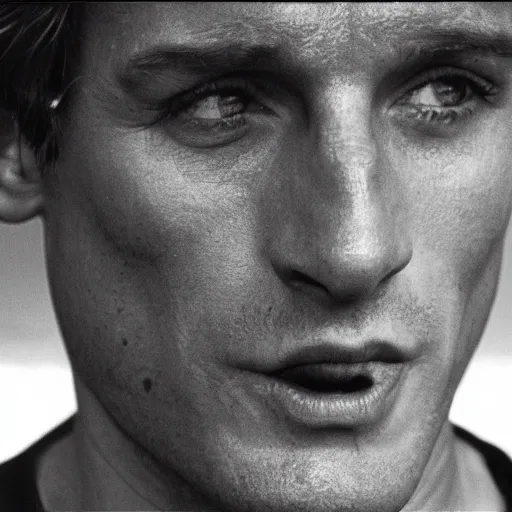 Prompt: 80s movie still of Francesco Totti with highly detailed face , cine still , black and white, 30mm heavy grain, cinematic, dramatic dark shadows