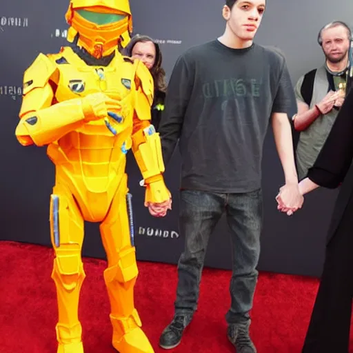 Prompt: red carpet press photo of Pete Davidson holding hands with Master Chief