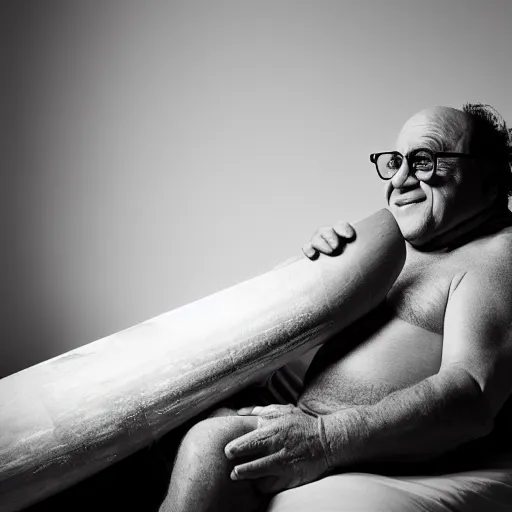 Image similar to Danny DeVito laying on a bed playing with his didgeridoo, cinematic, studio light, 8K,