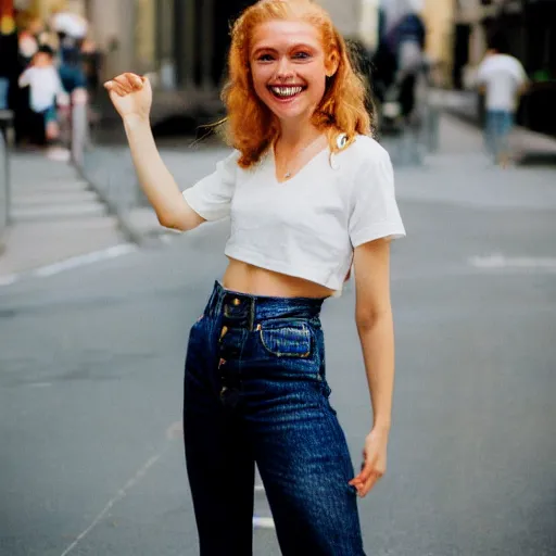 Prompt: Portrait photograph of a Strawberry-Blonde Girl, Young Beautiful Face, Green Eyes, Freckles, Wearing a white crop-top and jeans, with a subtle smile, Humans of New York Style, Leica Camera 50mm lens, street photography, grainy film photo