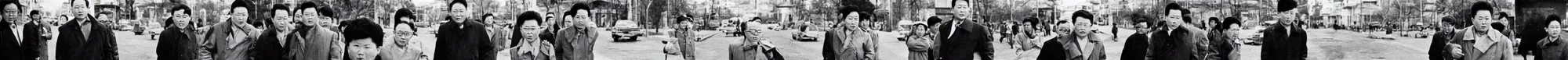 Image similar to kim jong - il walking in 1 9 6 0 s pyongyang, film noir thriller in the style of orson welles and andrei tarkovski