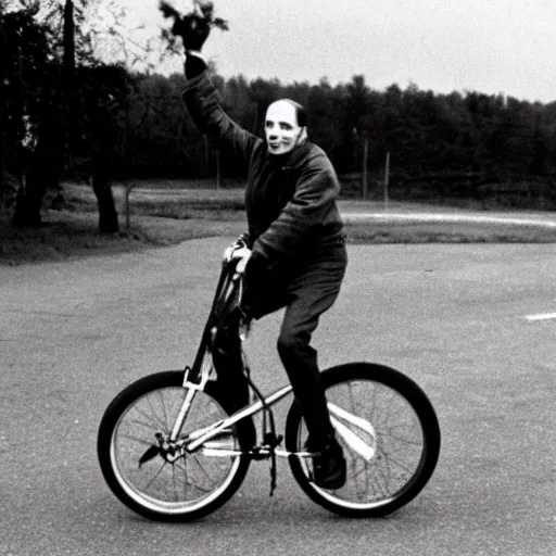 Prompt: Ingmar Bergman riding a unicycle