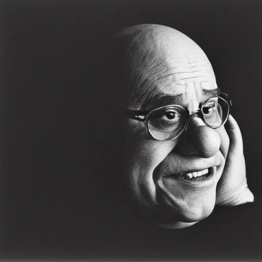 Prompt: Danny DeVito in ((clown makeup)), portrait photograph, serious sad, low contrast ilford hp5 film, black and white, high grain