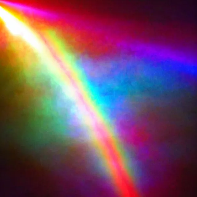 Image similar to glowing rainbow beam of light, vintage