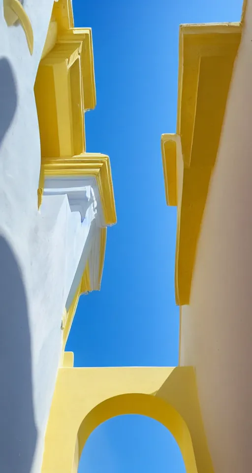 Image similar to pastel yellow greek architecture in front of a light blue clear sky, beautiful, minimalistic, aesthetic, two tone