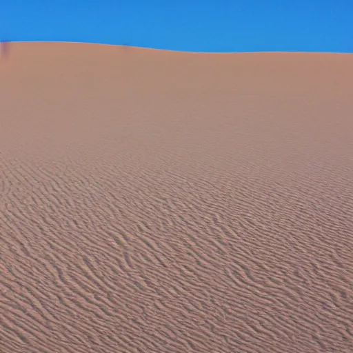 Image similar to a desert landscape like this one often features sand dunes. sand dunes, formed by the wind, come in many shapes and sizes. the direction of the wind can be indicated by the ripples in the dunes — the sides of dunes without ripples usually face the wind.