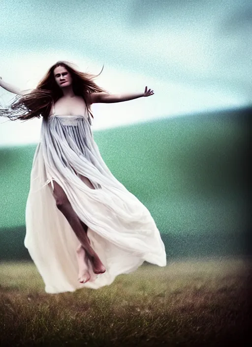 Image similar to cinestill 5 0 d portrait photo of a beautiful woman, britt marling 3 / 4, delicate, subsurface scattering, long hair floating in air in style of gilles zimmermann, 1 5 0 mm, windy mood, dress in voile, mute dramatic colours, soft blur outdoor stormy background, volumetric lighting, hyper detailed, hyper realistic