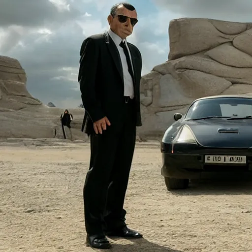 Image similar to Confused Rowan Atkinson as an MiB agent looking at a bizzare alien in the new Men in Black movie