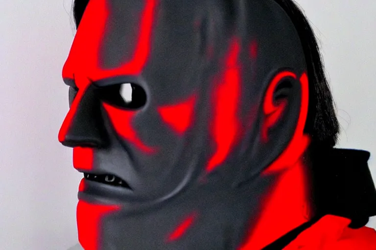 Prompt: michael myers mask, in the style of stanley kubrick, side profile, red, black, vibrant, high detail, realistic, scary, frightening