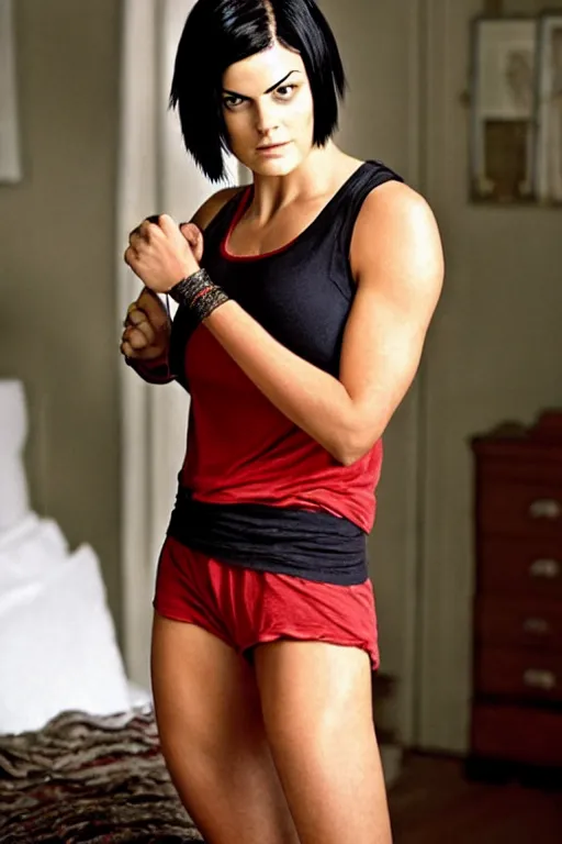 Image similar to realistic photograph. warrior woman, 2 7 years old, in her bedclothes. jaimie alexander. her hair is short, straight, raven - black. fair - complected but tan. tall and gracile, except for her thick ripped vascular buff muscular arms and her ample bust. she wears tight, white tanktop lose, comfortable, red pajama pants.