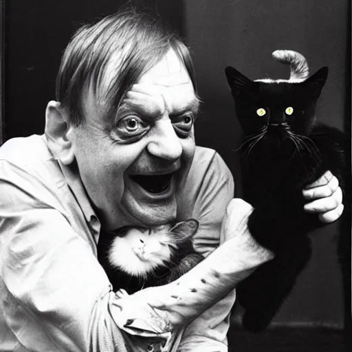 Image similar to laughing mark e smith with a cute kitty on his head