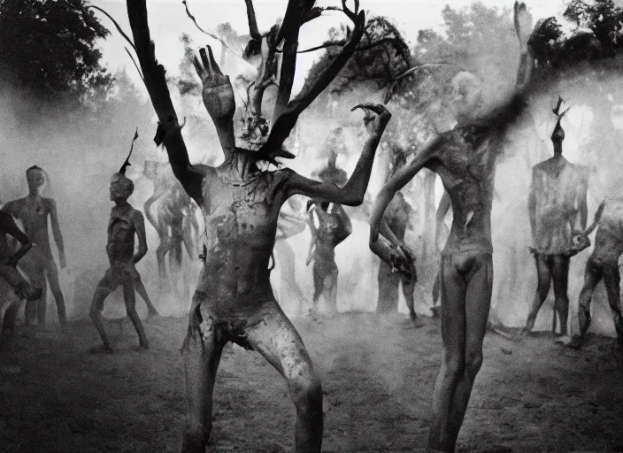 Image similar to 3 5 mm still from film by roger ballen, surreal dance scene of ritual in a picturesque outdoors setting, ashes, new guinea mud man, smoke, close - up of the actors faces, sharp, medium format 6 x 6, 1 6 k