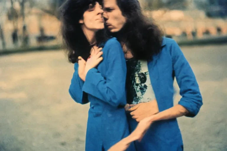 Prompt: film photography, 35mm, 1970s, no faces, no portraits, close-up love and romantic in blue colors feeling of young and freedom, in style of Joel Meyerowitz