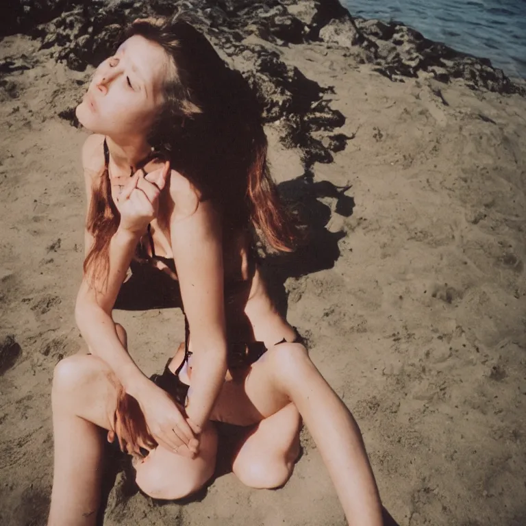 Image similar to portrait of an ancient vampire queen enjoying a day at the beach, 35mm photography