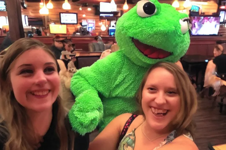 Image similar to taking a selfie with a frog fluffy mascot costume at an applebee's, cell phone photo