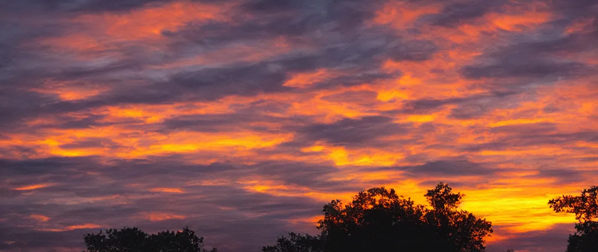 Prompt: spectacular sunset, hyperrealistic, photograph, 35mm, sharp focus