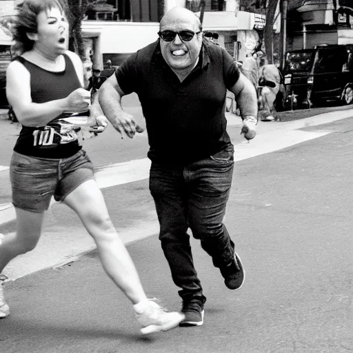 Image similar to realistic action photo of an Angry Alex Jones, running after small giggling Danny DeVito carrying an ice cream