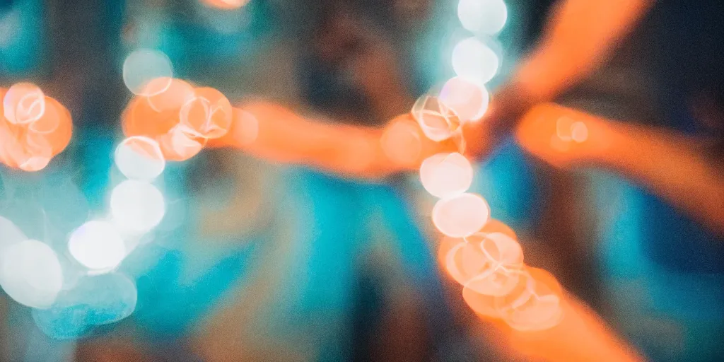 Image similar to a blurry picture of gorgeous human bodies intertwined, long exposure photograph, anamorphic bokeh, orange and cyan lighting, cinematic