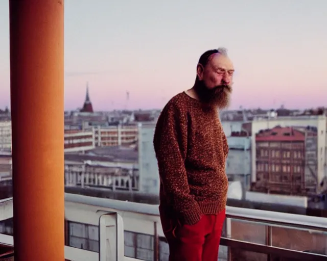 Prompt: lomographic photo of 4 0 years russian man with beard and sweater standing on small hrushevka 9 th floor balcony in taigaд looking at sunset, perfect faces, cinestill, bokeh